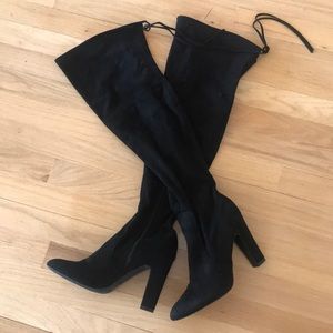Thigh high black Heeled boots